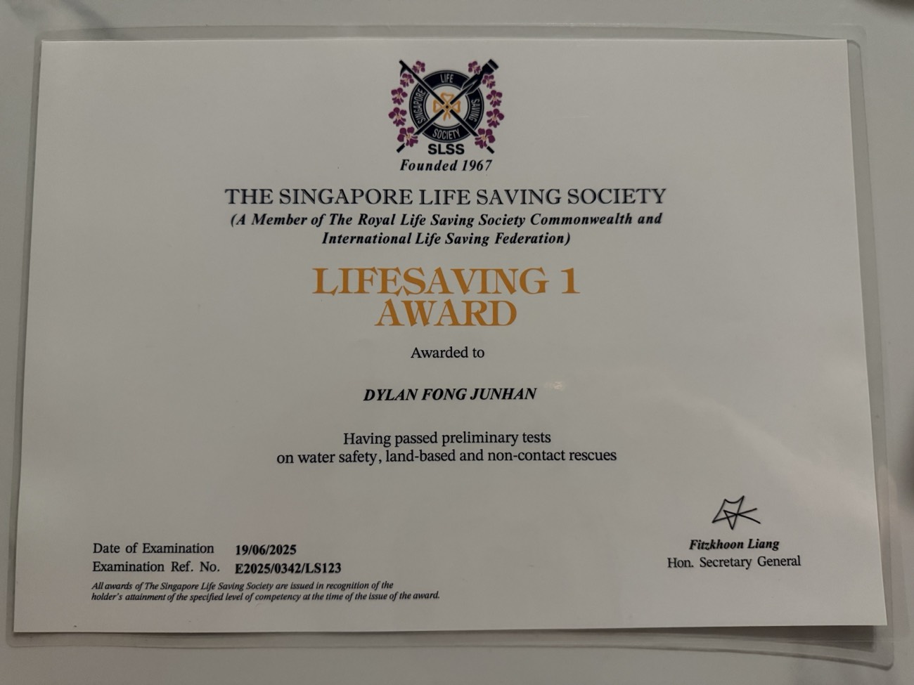 Singapore Lifesaving Society SLSS Lifesaving 1 certificate held by 02H Swim School coach Dylan Fong