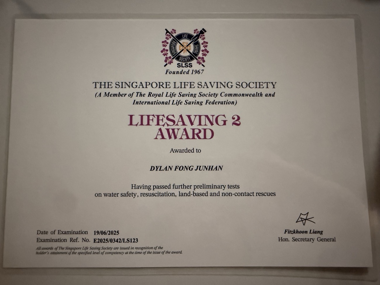 Singapore Lifesaving Society SLSS Lifesaving 2 certificate held by 02H Swim School coach Dylan Fong