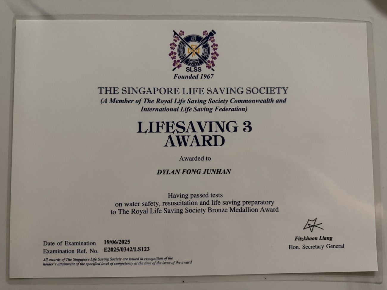 Singapore Lifesaving Society SLSS Lifesaving 3 certificate held by 02H Swim School coach Dylan Fong