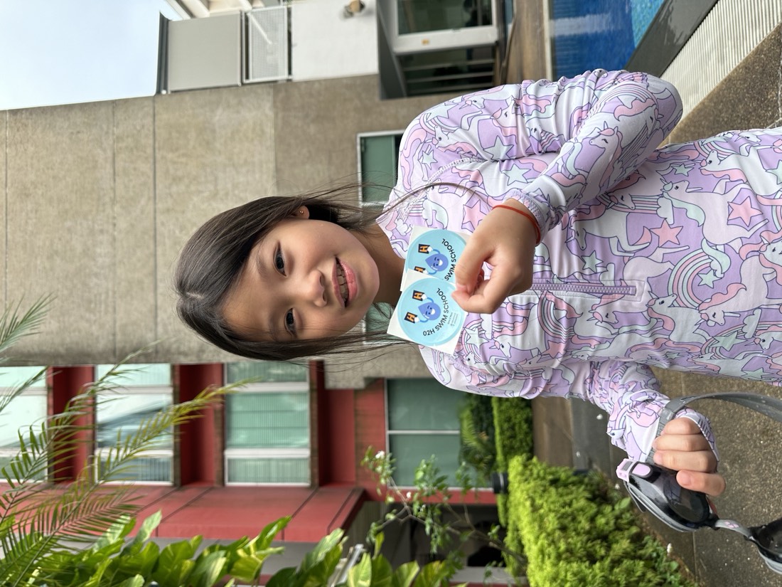 Kid learning to swim at a Singapore condominium pool with 02H